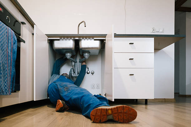 Professional Plumbing technician working in Kenton, DE